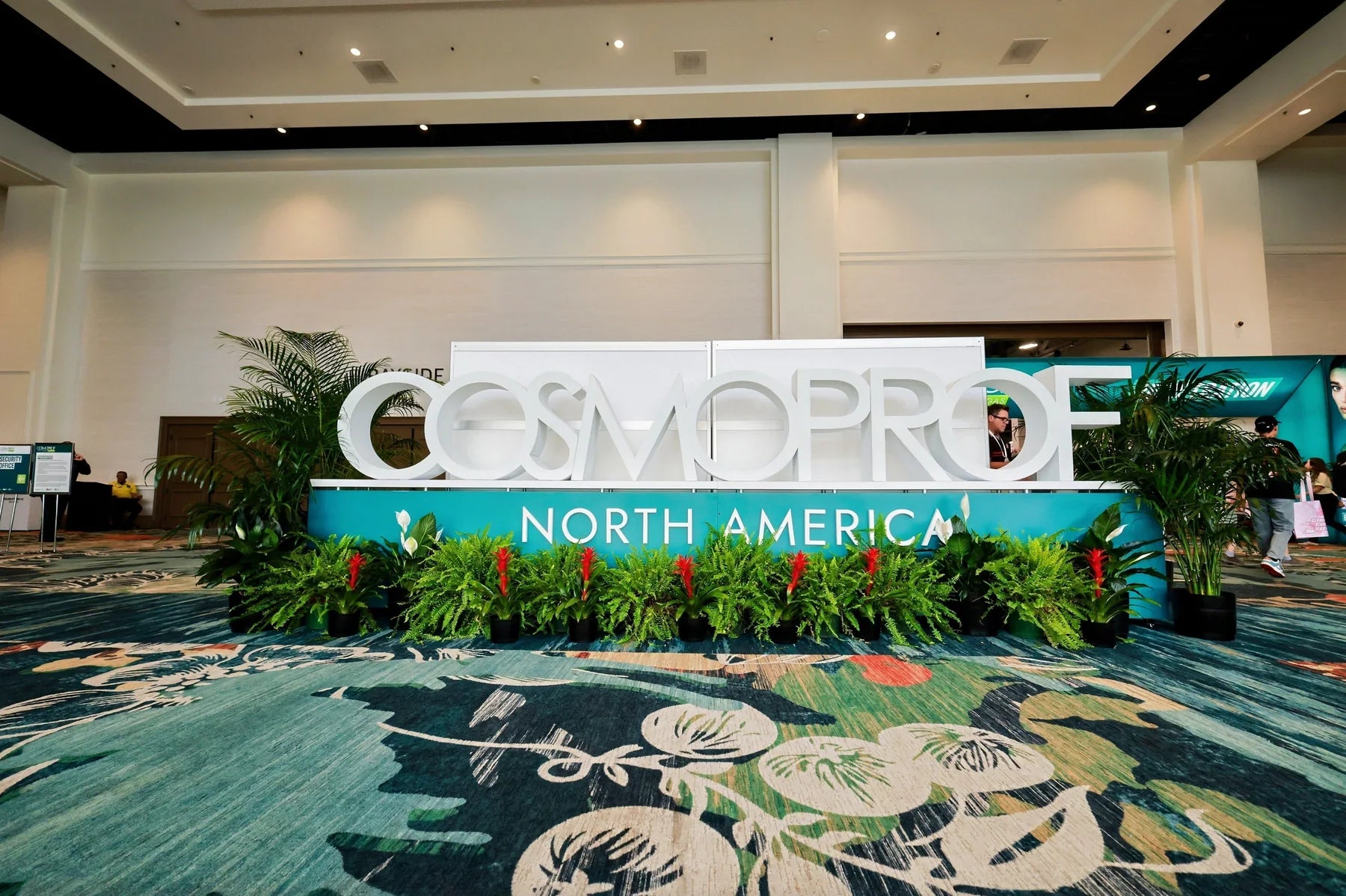 The Cosmoprof North America welcome display marks the beginning of the visit.