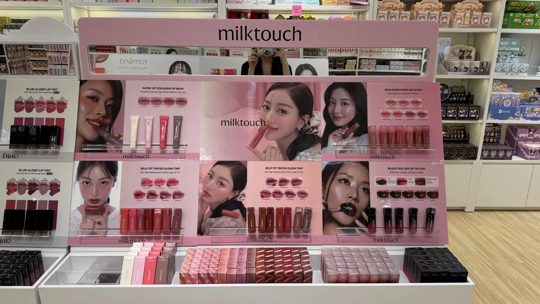 The milktouch display brings product photography and neatly grouped color cosmetics together.