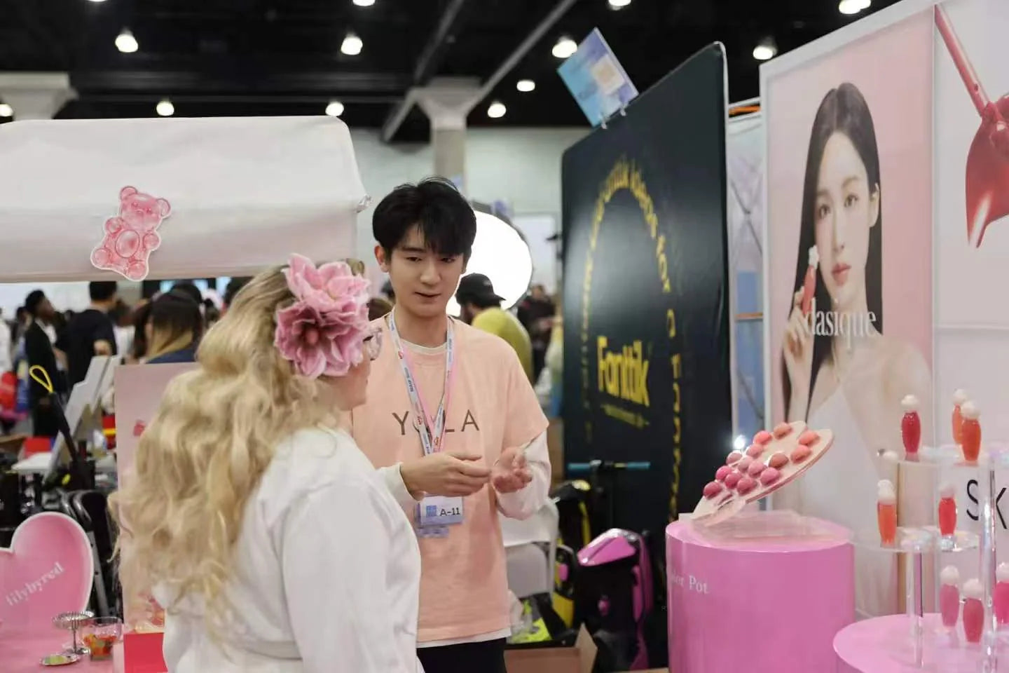 An in-person introduction at the booth, with products close at hand for a closer look.