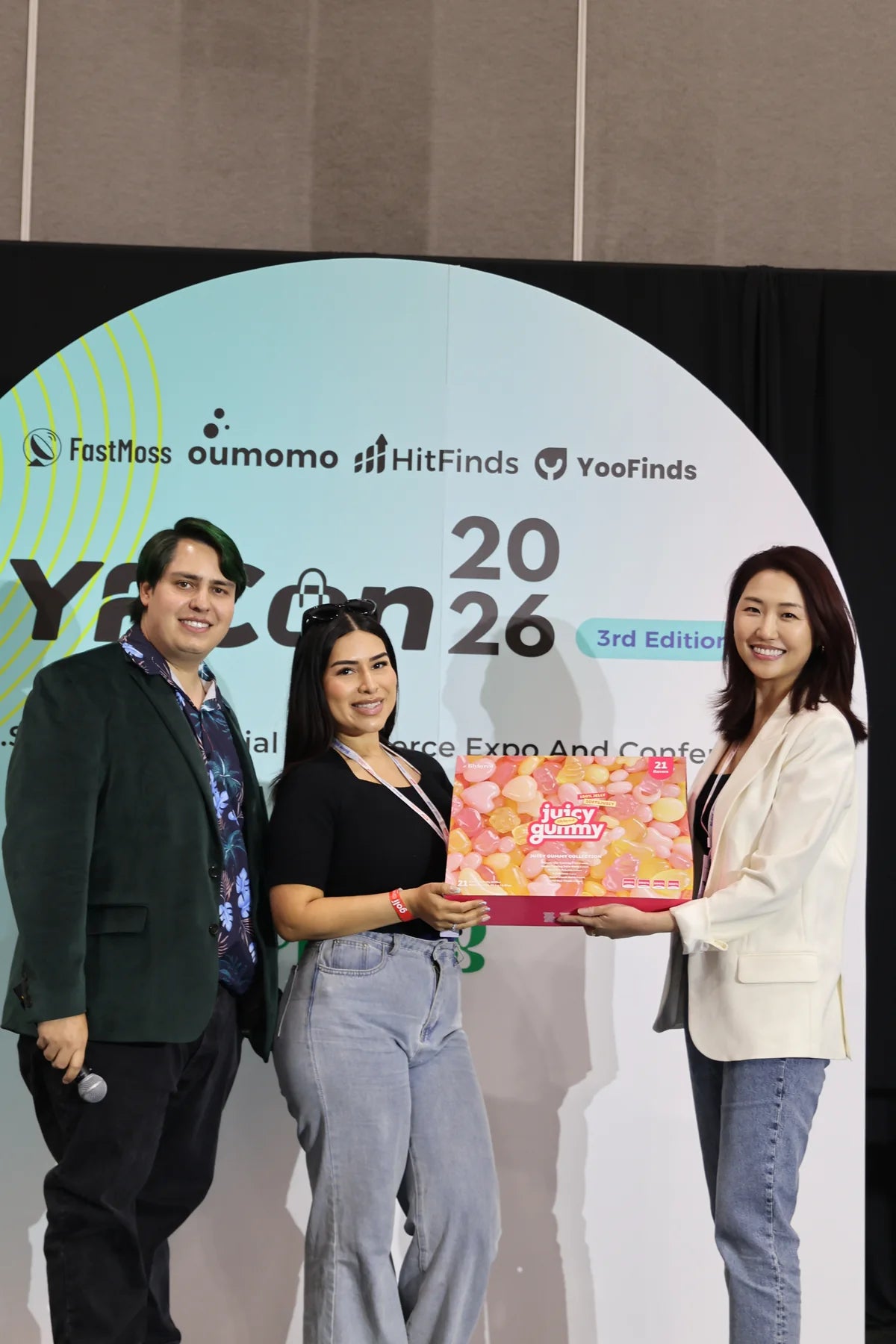 A photo at the YFCon 2026 backdrop captures another moment from the event.